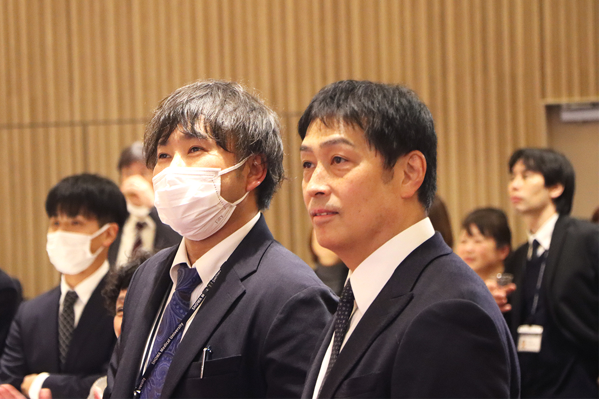 飯塚祐司監督と参加者